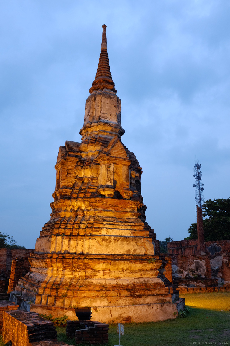 Illuminated temple ruins as sunset.